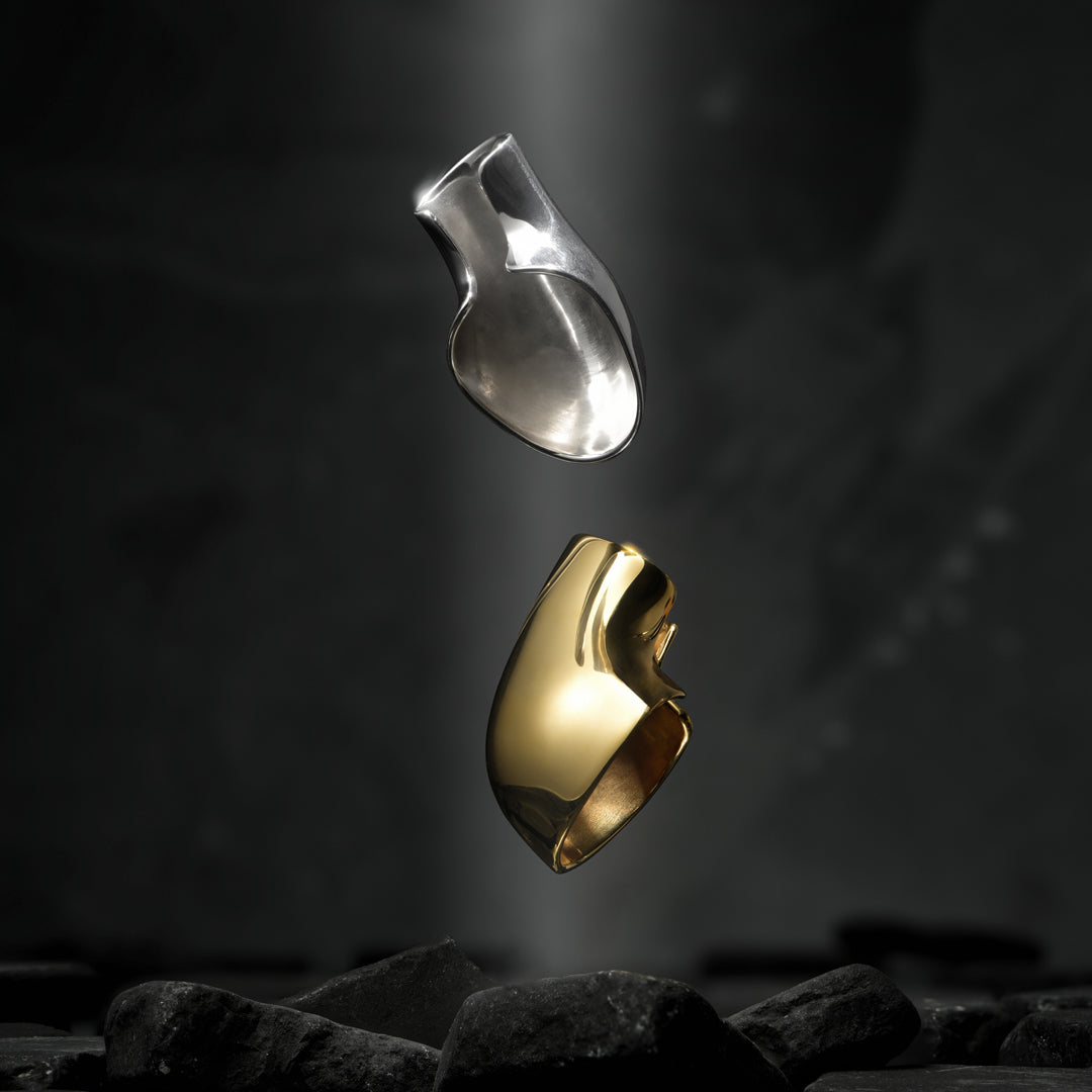 Modern no-piercing ear cuff—futuristic design in sterling silver with high-shine mirrored finish.