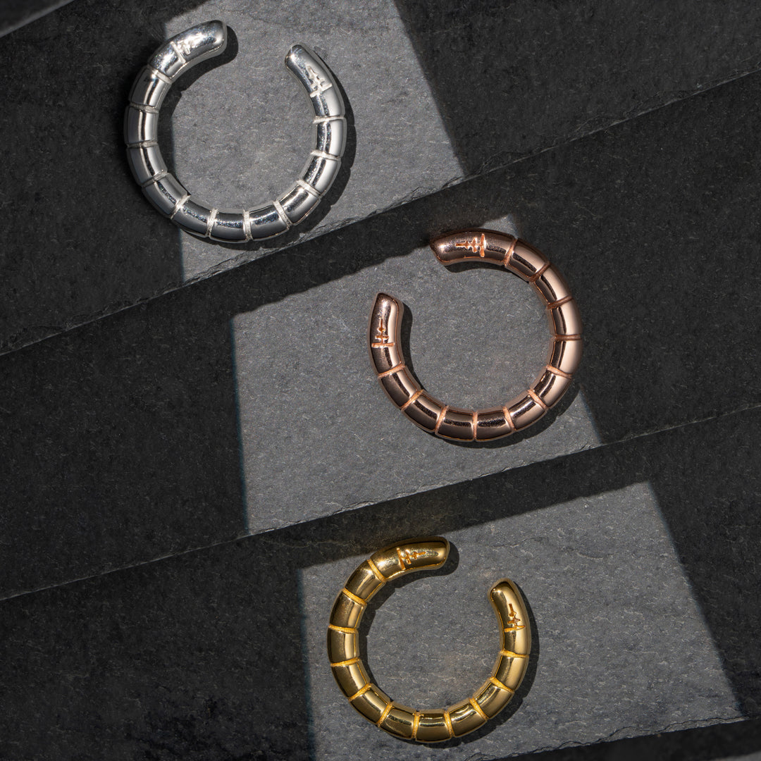 Sculptural Rift Ear Cuff—eye-catching design with polished rifts for a bold, modern look.