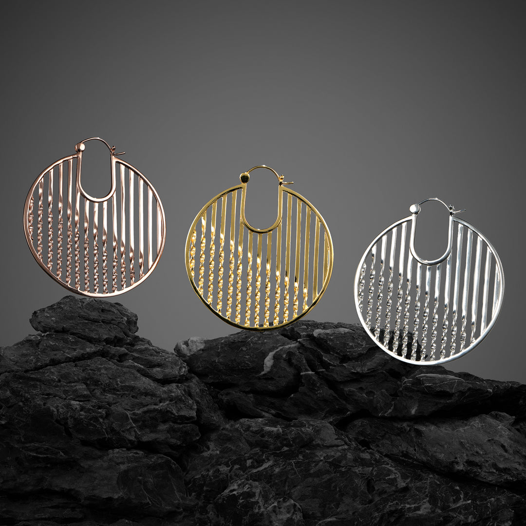 Handcrafted twisted hoops with dynamic design for lobes or eyelets