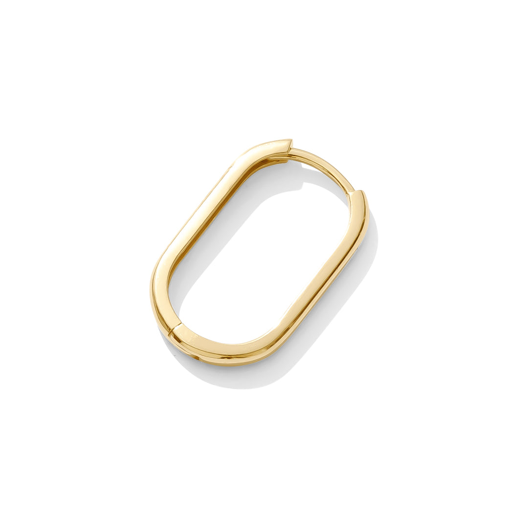 Lola Earring 18k gold vermeil with sleek oval shape and squared edges flat lay at an angle, modern minimalist design by TAWAPA