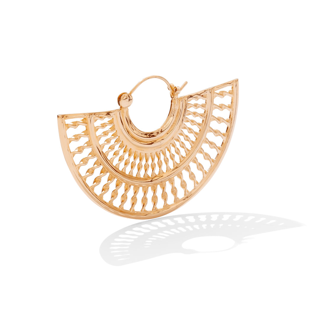 Handcrafted brass hoop earrings with sunburst texture and sterling silver hinge clasp