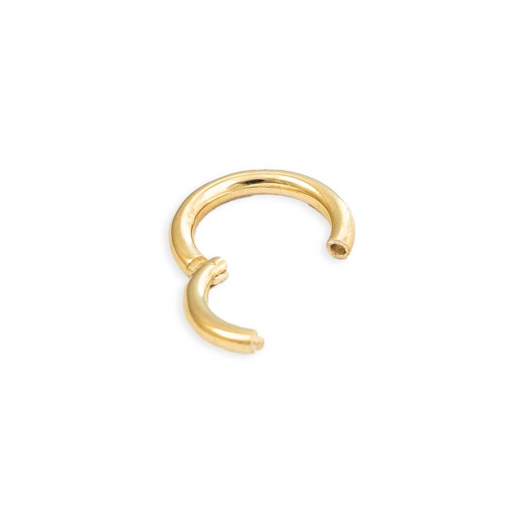 understated luxury 14k gold clicker for curated ears