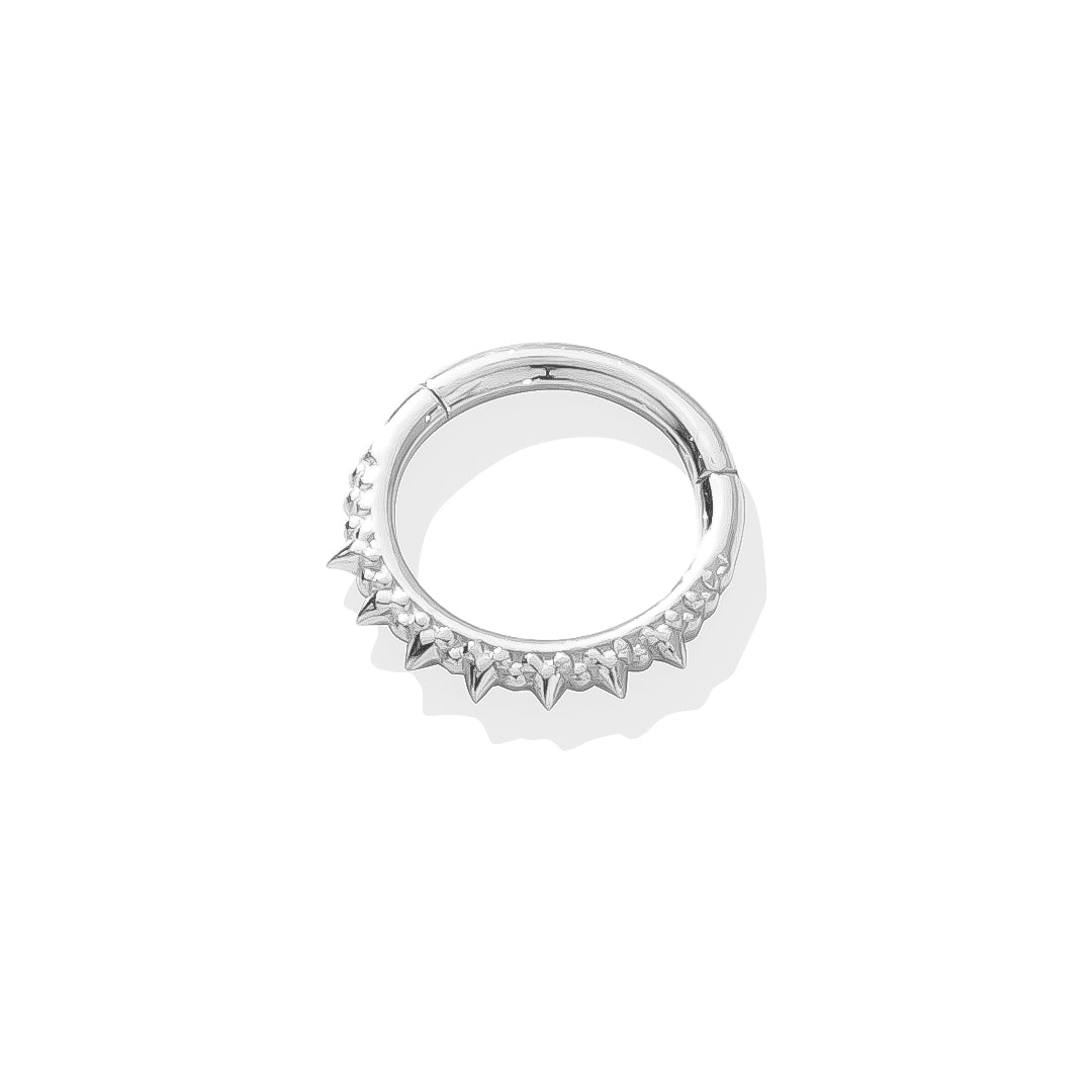Solid 14k gold Brooklyn Clicker with edgy spike details and decorative design.