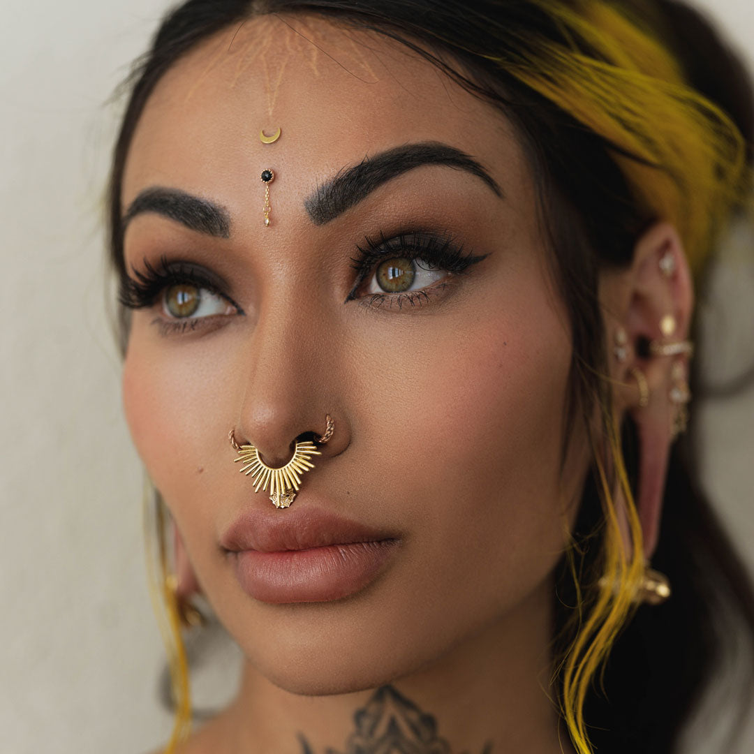 Fury septum clicker in 14k gold with gemstone accents

