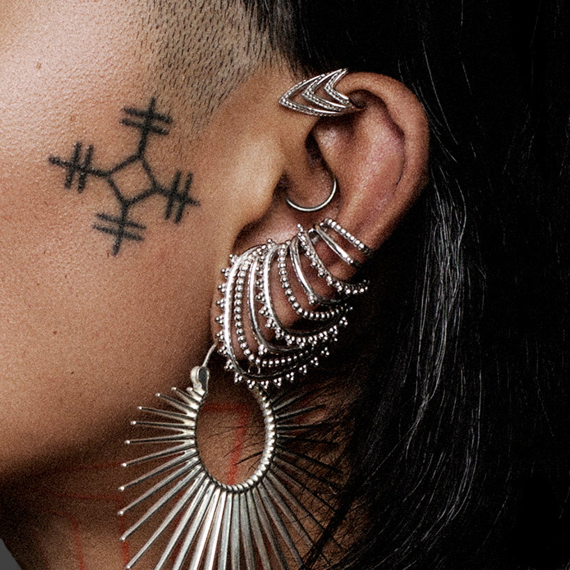 ear with silver ear cuffs closeup TAWAPA