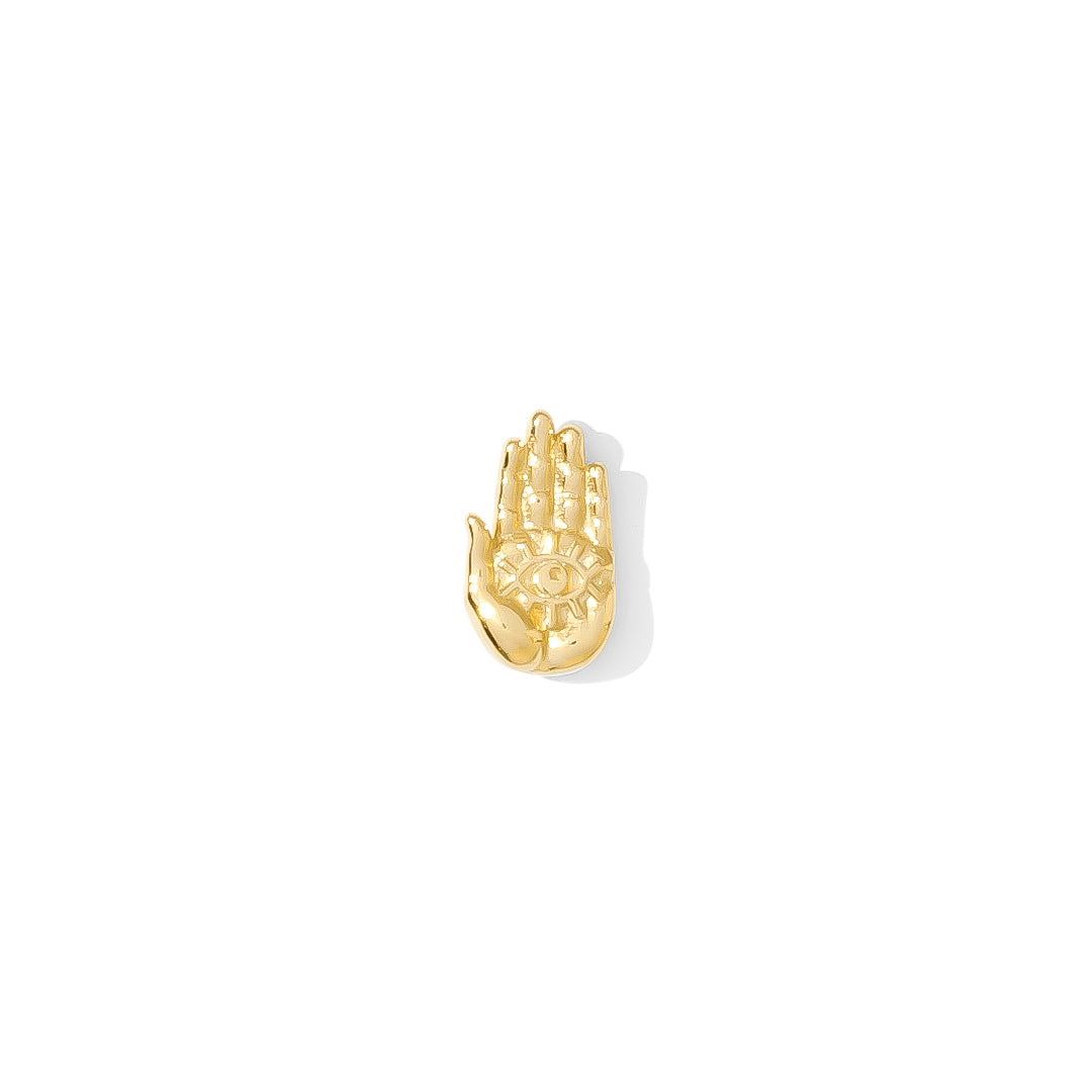mystical body jewelry featuring a palm with eye detail