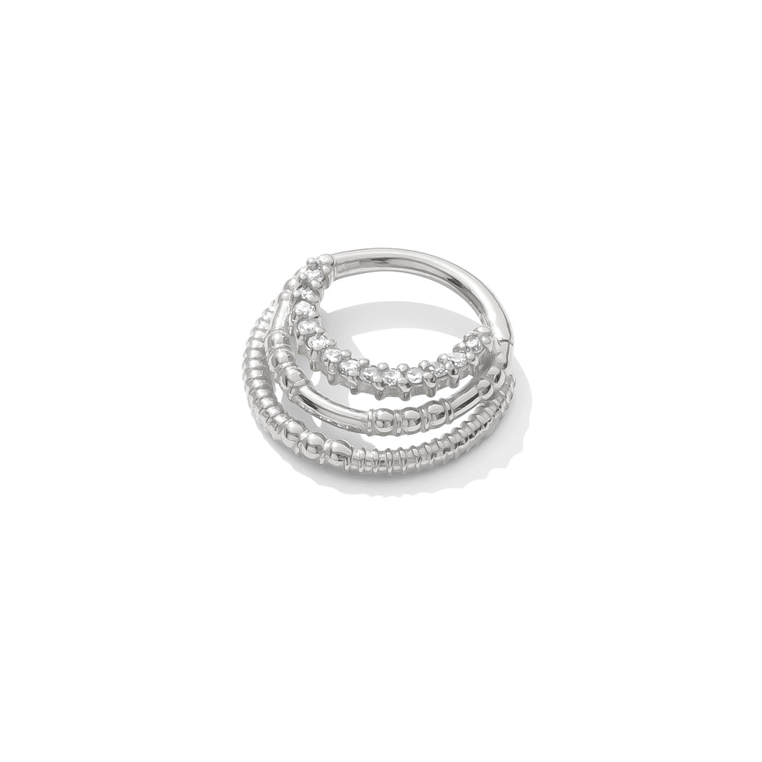 14k white gold Harmony Clicker with triple rings and 13 gemstones handcrafted TAWAPA septum jewelry angled view