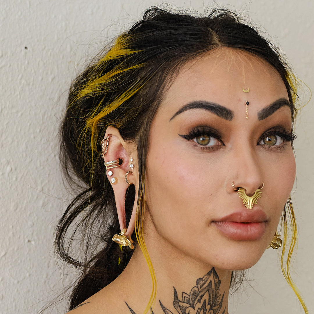 Luxury gold prong piercing jewelry