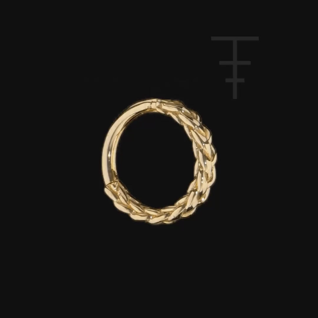 Elegant gold clicker ring featuring unique four-sided braid pattern