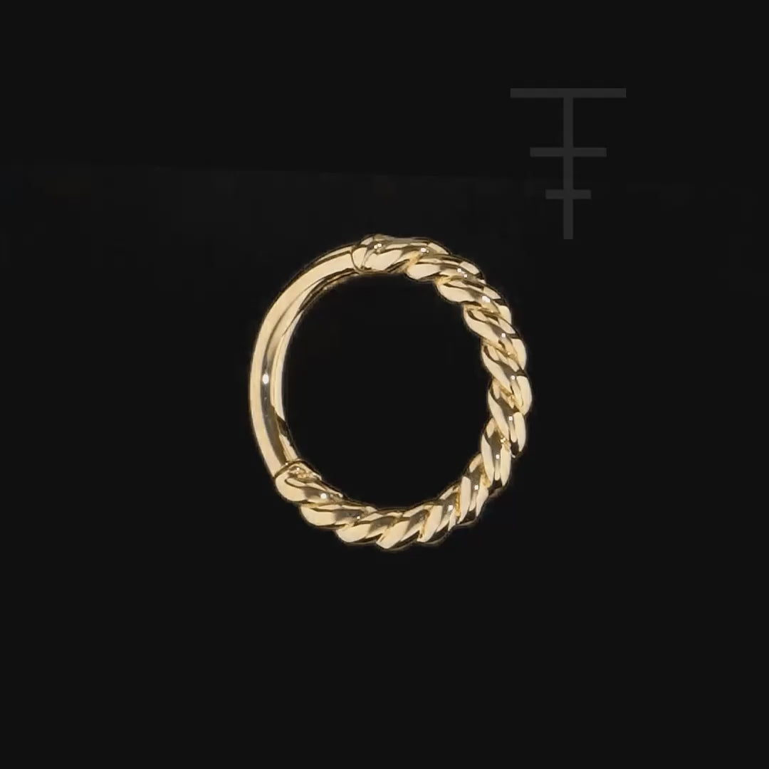 Luxurious 14k gold clicker ring featuring twisted rope texture