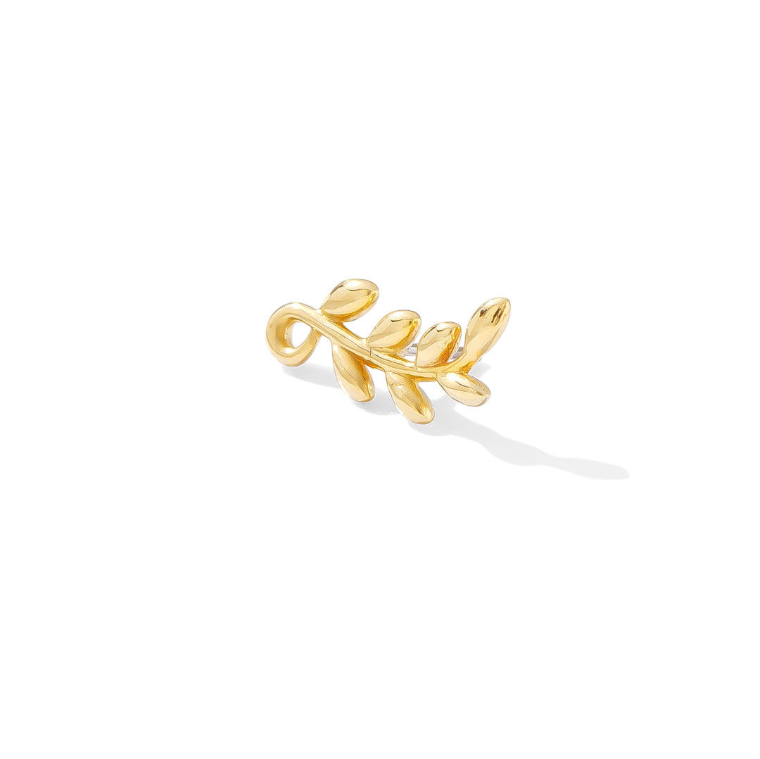 14k gold piercing jewelry shaped like a curling vine